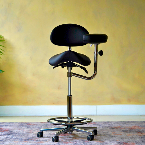 ProNorth Pro Assistant dental assistant saddle stool with an adjustable body-support arm for chairside assisting.