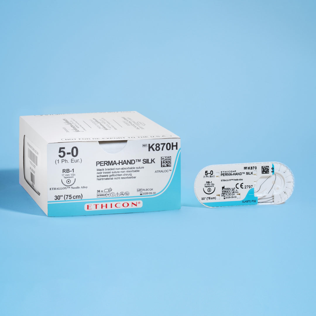 Box of PERMAHAND® 5-0 Black Silk Sutures, model K870H, showcasing an extended 30-inch length paired with a 17mm RB-1 taper point needle. The packaging underscores the suture's non-absorbable nature and exceptional durability, designed for effective and secure wound closure across a range of surgical procedures.