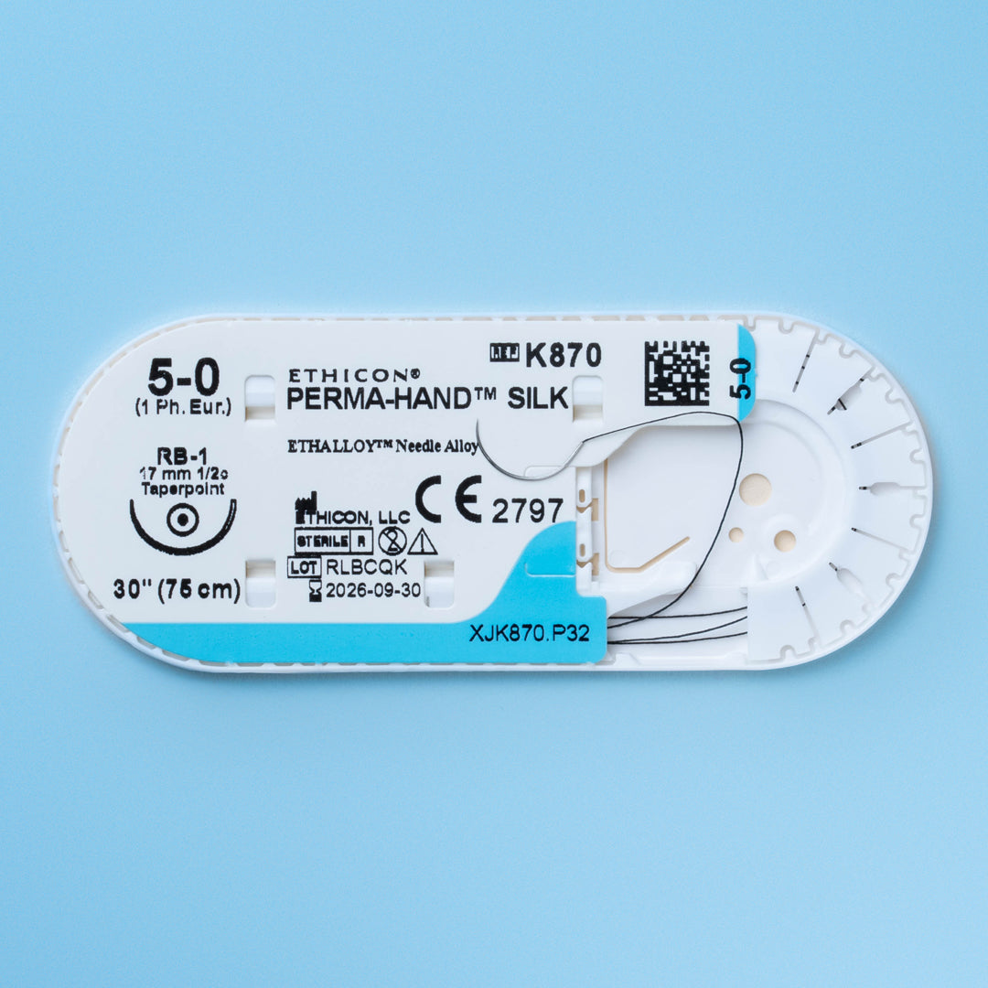 Box of PERMAHAND® 5-0 Black Silk Sutures, model K870H, showcasing an extended 30-inch length paired with a 17mm RB-1 taper point needle. The packaging underscores the suture's non-absorbable nature and exceptional durability, designed for effective and secure wound closure across a range of surgical procedures.