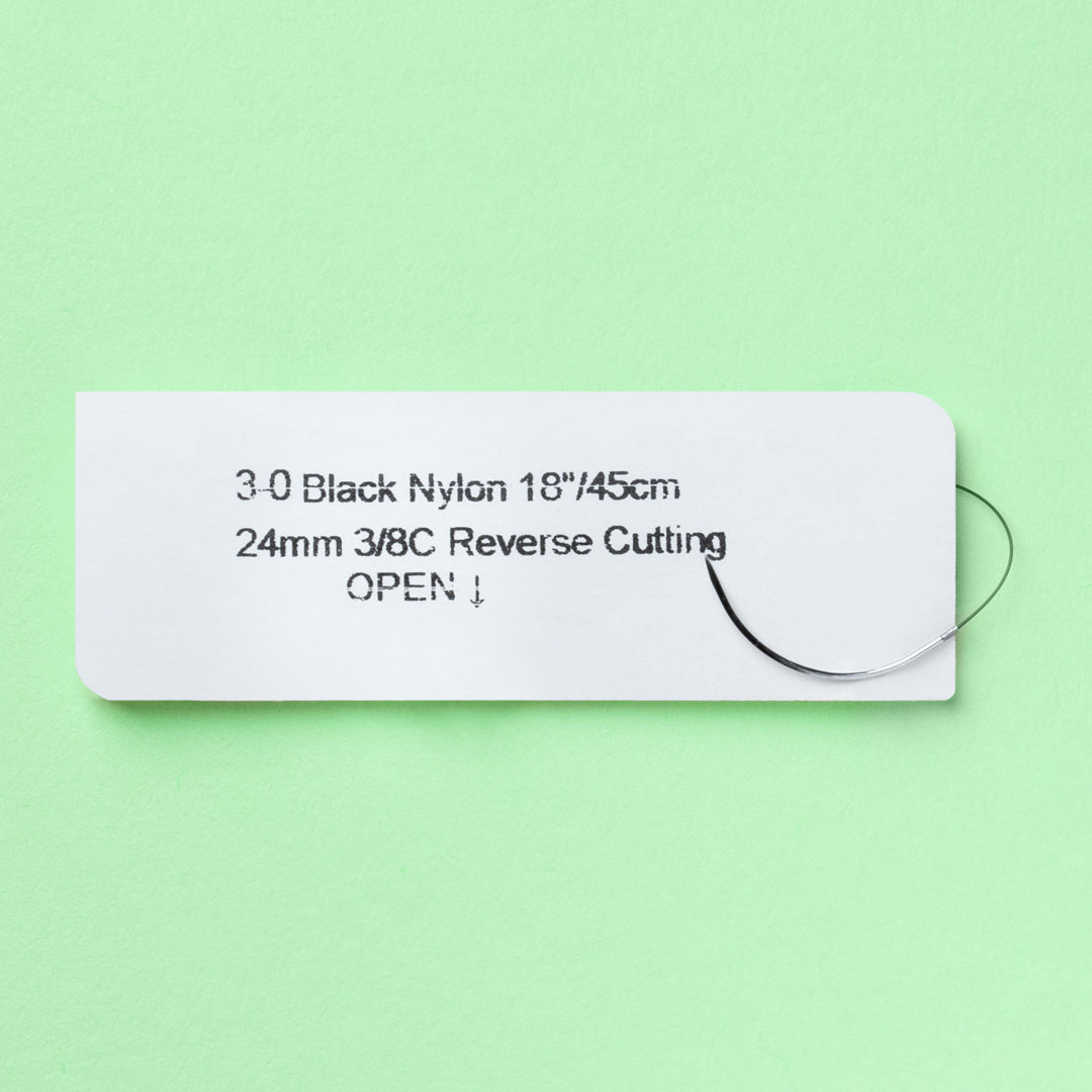 Box of 3-0 Nylon Black sutures with a C-7 reverse cutting needle, model 925B, indicating a non-absorbable suture material designed for permanent tissue approximation. The packaging features a QR code for easy product identification and underscores the suture's suitability for a wide range of surgical applications.