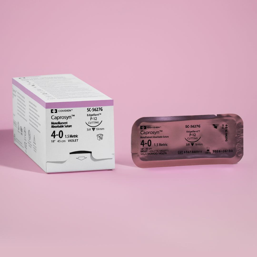 Image of a box of Covidien's CAPROSYN Monofilament Absorbable Sutures, size 4-0, with product reference SC-5627G. The packaging is marked in violet, highlighting the suture's size, needle type P-12 reverse cutting, and length of 18 inches. Symbols on the box denote its absorbable and monofilament characteristics, emphasizing its suitability for precise surgical applications.