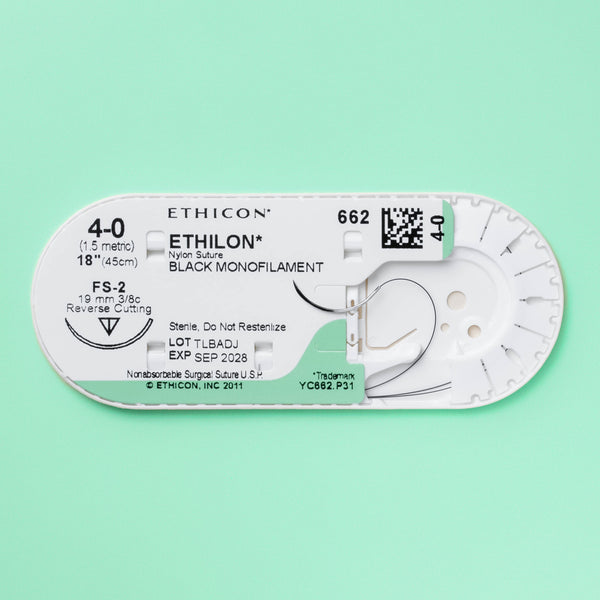 Box of Ethicon 4-0 ETHILON® Black Nylon Sutures, product number 662G, featuring a striking black suture color and an FS-2 reverse cutting needle, indicating its non-absorbable property and suitability for permanent wound closure in various surgical applications.