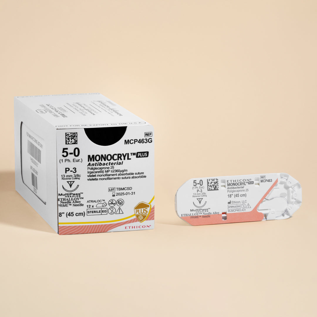 Box of Ethicon 5-0 MONOCRYL® Plus Violet Sutures, MCP463G, featuring antibacterial properties with an 18-inch length and a silver P-3 reverse cutting needle. The suture's unique composition and color are designed for effective wound closure with added infection control.