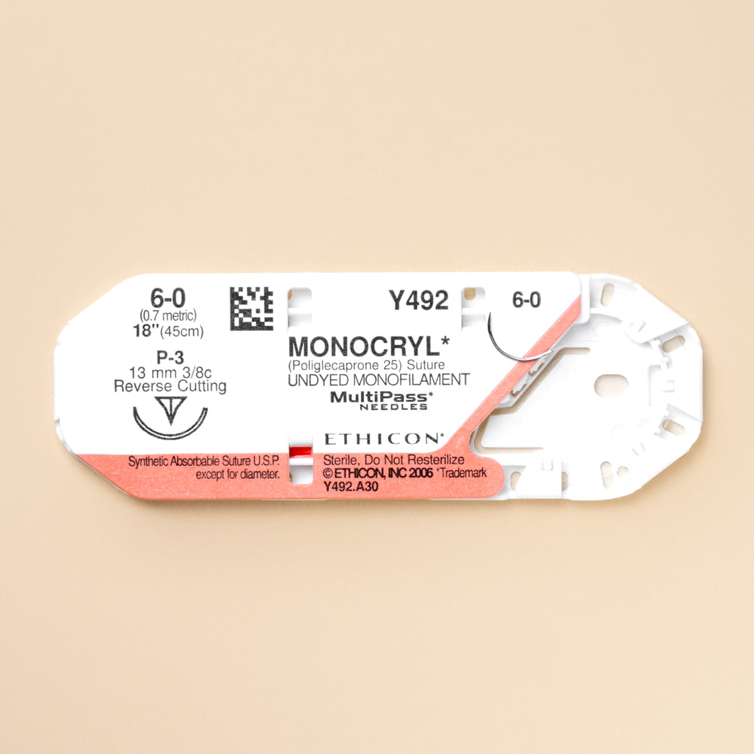 Box of Ethicon 6-0 MONOCRYL® Undyed Sutures, reference Y492G, showcasing a fine gauge suture paired with a 13mm P-3 reverse cutting needle. The packaging emphasizes the suture's absorbable nature and suitability for precise surgical applications, ensuring a natural finish and rapid healing.