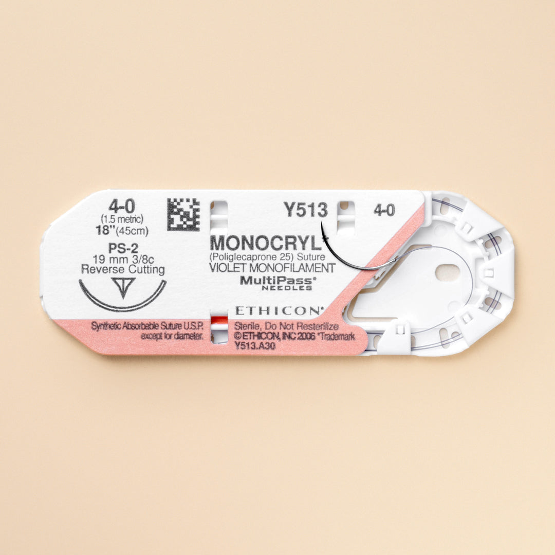 Box of Ethicon 4-0 MONOCRYL® Violet Sutures, product code Y513G, complete with an 18-inch suture and a 19mm PS-2 reverse cutting needle. The packaging highlights the suture's absorbable nature and the vibrant violet color, designed for superior visibility and precision in surgical applications.