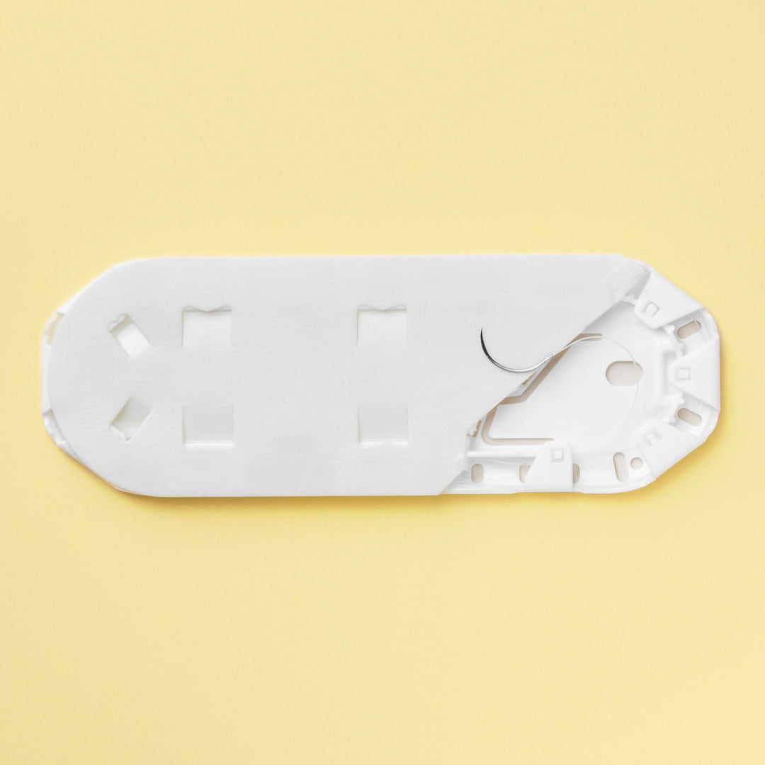 Box of 5-0 Fast Absorbing Gut sutures, reference 1915G, with yellowish-tan threads and a 13mm PC-1 conventional cutting needle, designed for quick absorption and delicate tissue approximation in surgical procedures, presented in the classic packaging