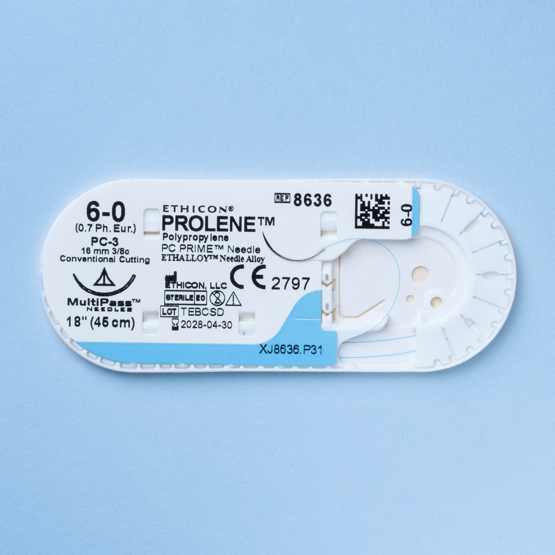 A box of PROLENE® 6-0 Blue Polypropylene Sutures, model 8636G, displaying extremely fine sutures with a 16mm PC-3 conventional cutting needle for high-precision surgical tasks and enduring wound support