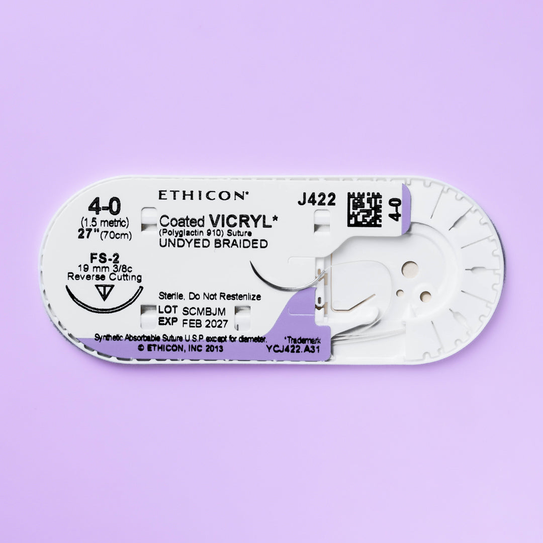 Box of COATED VICRYL® 4-0 Undyed Sutures, model J422H, equipped with a 27-inch FS-2 reverse cutting needle, designed for a broad spectrum of surgical procedures. The undyed material signifies its suitability for ensuring natural healing processes, packaged in quantities of 36 to support extensive medical use