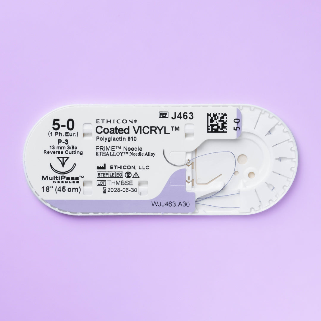 Box of COATED VICRYL® 5-0 Violet Sutures, model J463G, displaying the sutures equipped with a 13mm P-3 prime reverse cutting needle. The sutures' violet color enhances visibility during surgery, packaged in a set of 12 for specialized surgical applications, emphasizing ease of use and patient comfort.