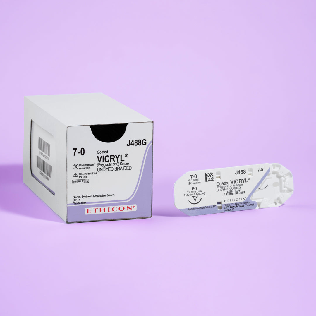 Box of COATED VICRYL® 7-0 Undyed Sutures, model J488G, showcasing ultra-fine sutures with an 11mm P-1 prime reverse cutting needle for microsurgical accuracy. The packaging emphasizes the sutures' absorbable nature and precision application in delicate surgical environments, ensuring optimal healing and aesthetic results.