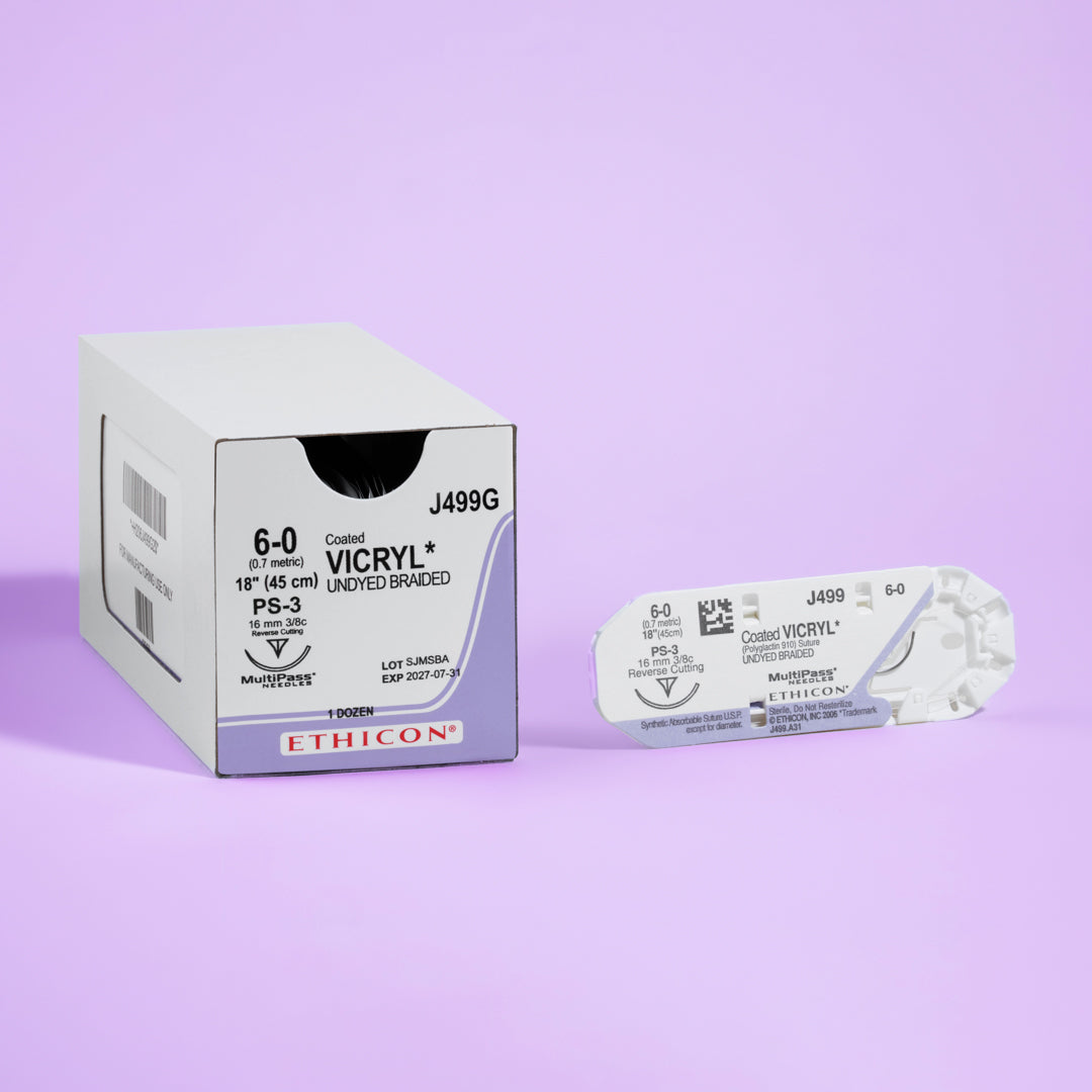 COATED VICRYL® 6-0 undyed suture, model J499G, with 18-inch length and PS-3 needle, packed in a box of 12 for surgical use. Highlighting its absorbable nature and specialized needle for precision in soft tissue approximation.