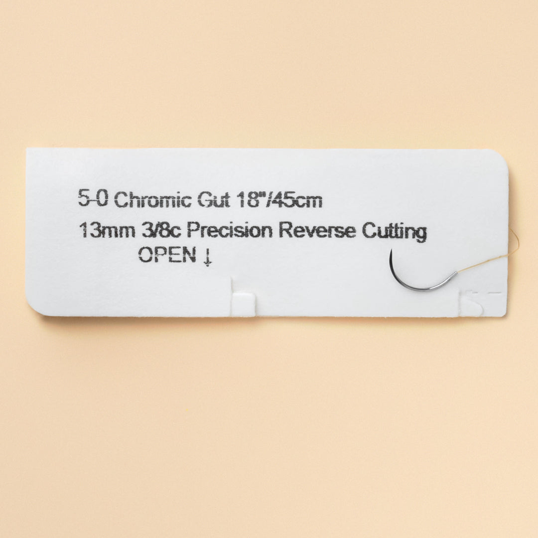 Box of 5-0 Chromic Gut sutures with a C-3 precision reverse cutting needle, model 1248B, highlighting the 2-week wound support and featuring a QR code for quick scanning. The package underlines sterility and the absorbable nature of the sutures for effective wound care management.