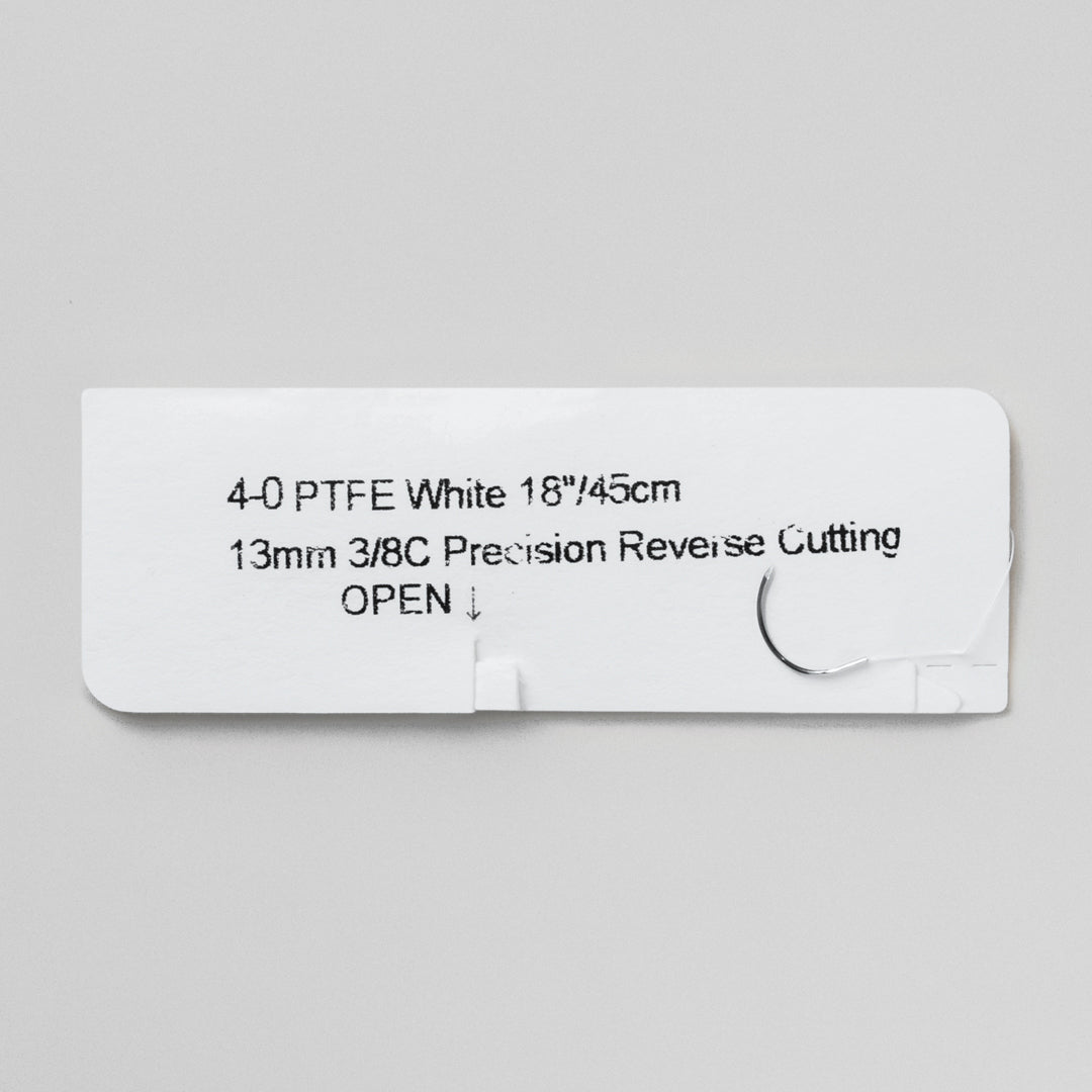 A box of 4-0 PTFE white monofilament sutures paired with a C-3 precision reverse cutting needle, reference number 820B. The packaging displays key information such as suture size, needle type, and sterility assurance with a QR code for detailed product traceability. The image highlights the suture’s suitability for delicate dental procedures, ensuring patient comfort and optimal healing.