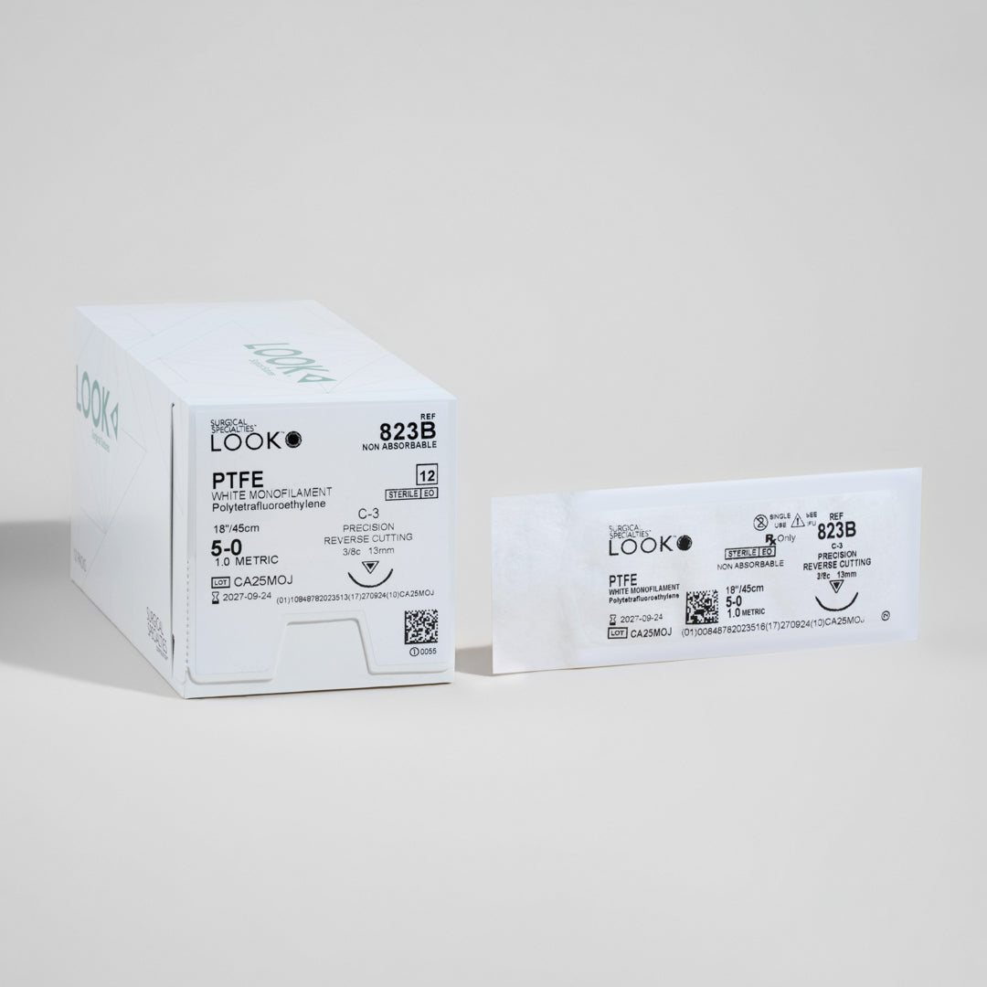 A box of 5-0 PTFE white monofilament sutures equipped with an 18-inch C-3 precision reverse cutting needle. The packaging, marked with reference number 823B, emphasizes the sterile, non-absorbable nature of the sutures and includes a QR code for quick information retrieval. Suitable for specialized surgical procedures requiring minimal tissue reaction and prolonged support.