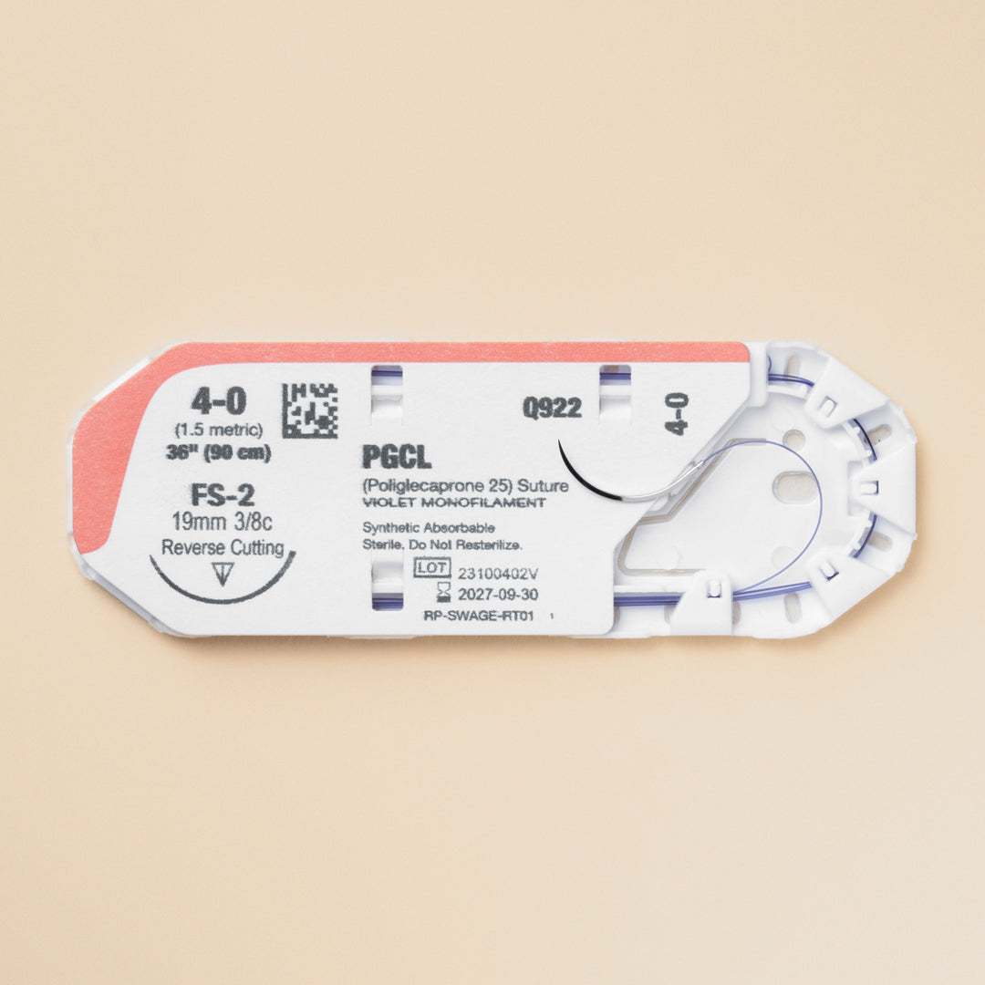 Image showcasing a box and individual packaging of 4-0 MONOPRO Violet 36" FS-2 Needle sutures. The box, marked with the reference PM922, highlights the suture's specifications, emphasizing its absorbable nature and suitability for veterinary use. This suture is presented as an ideal option for surgeries needing high-quality, reliable suturing material for effective wound management.