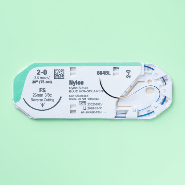 A box of 2-0 NYLOPRO with a 30-inch FS reverse cutting needle, showcasing the blue nylon monofilament suture for non-absorbable applications. The packaging, labeled with reference PN664BL, highlights its design for veterinary use, underlining ProNorth Medical's commitment to providing high-quality surgical sutures.