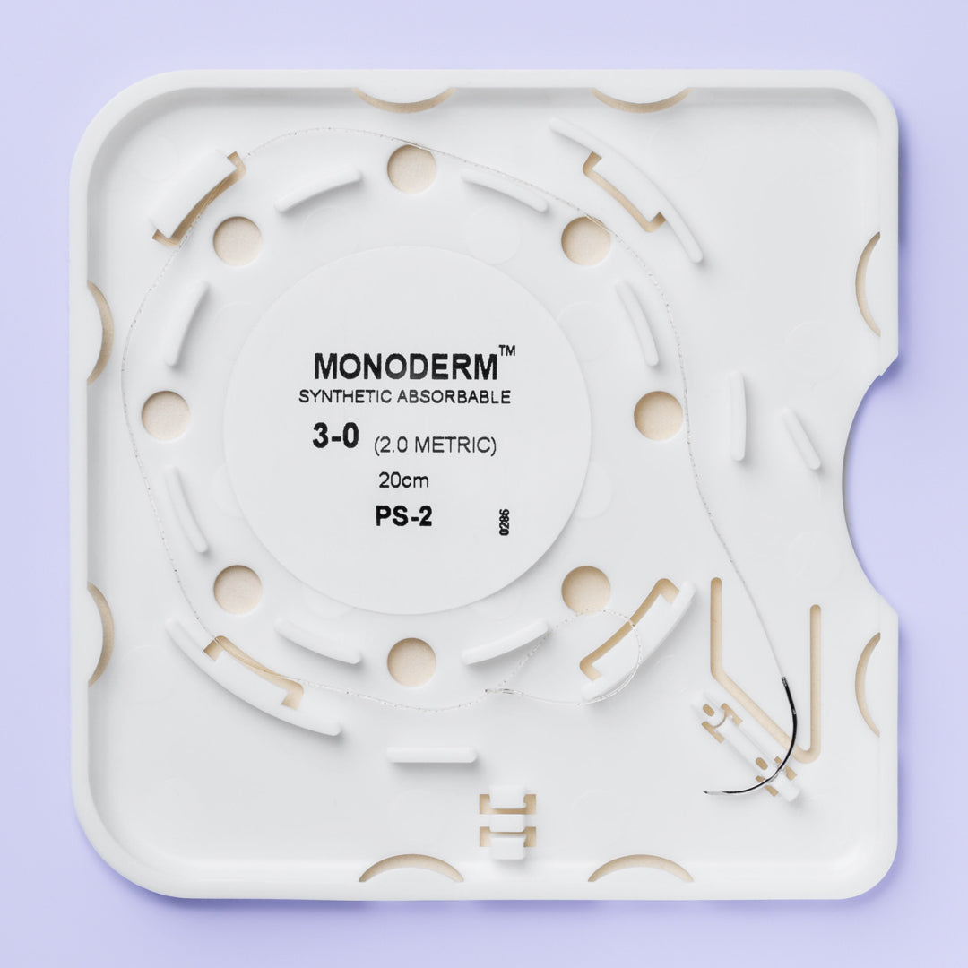 Image of the Quill Monoderm VLM-3007 suture box, prominently displaying its 3-0 suture size and 20cm length. The box, with a distinctive orange and purple color scheme, indicates the material as PGA-PCL undyed monofilament and the needle as PS-2 precision reverse cutting, 19mm in length. Information about the suture's 3-week wound support and Ethylene Oxide sterilization is also visible. The packaging includes a QR code, lot number, and regulatory markings for medical use.
