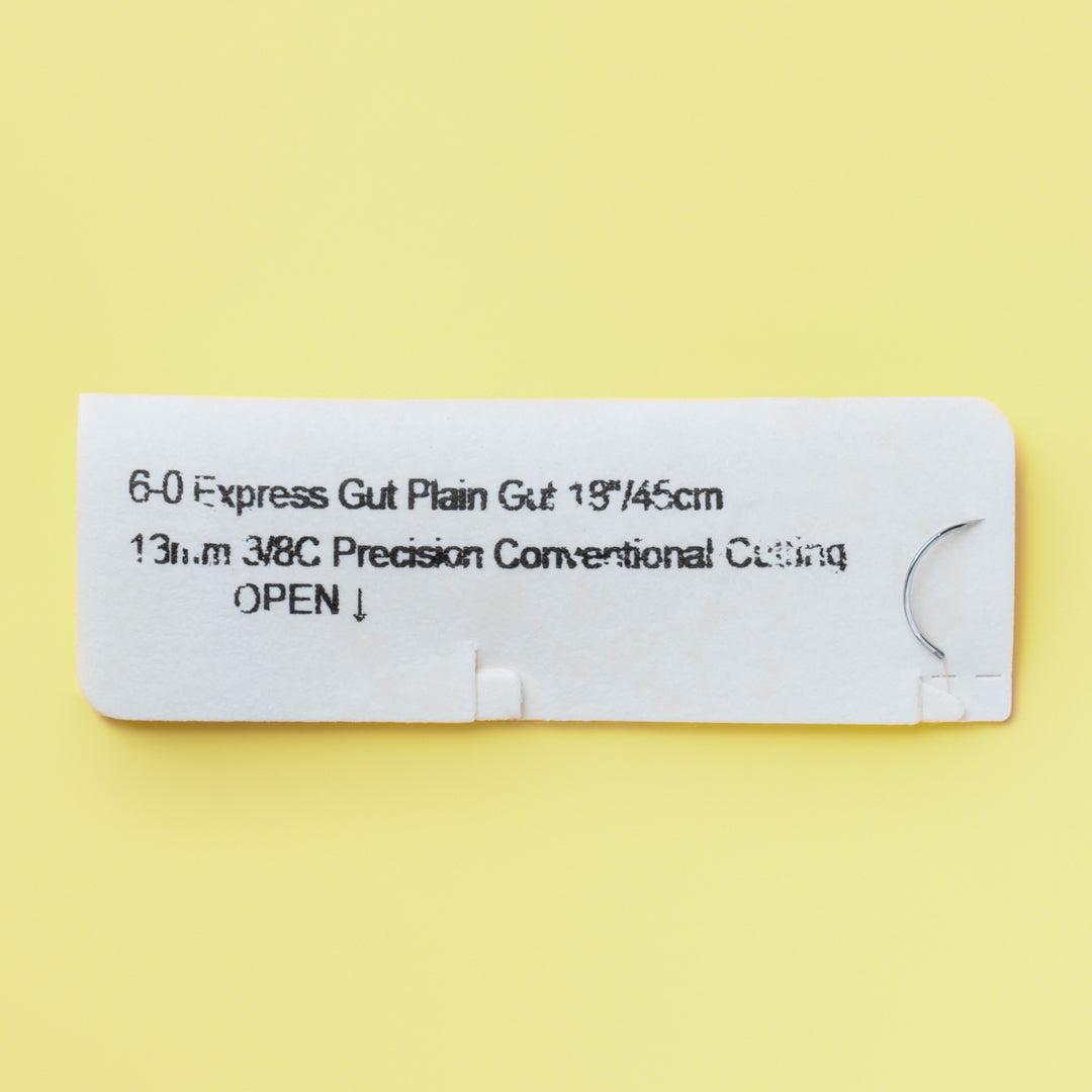 SharpPoint Express Gut 3-0 plain gut suture package, reference B1916N, displays 12 sutures, each 18 inches long, with a PC-1 precision conventional cutting needle, ideal for dermatologists, plastic surgeons, and emergency care professionals. The suture, known for its 1-week rapid absorption rate, is made from natural collagen, ensuring a smooth suturing experience and quick patient recovery. 