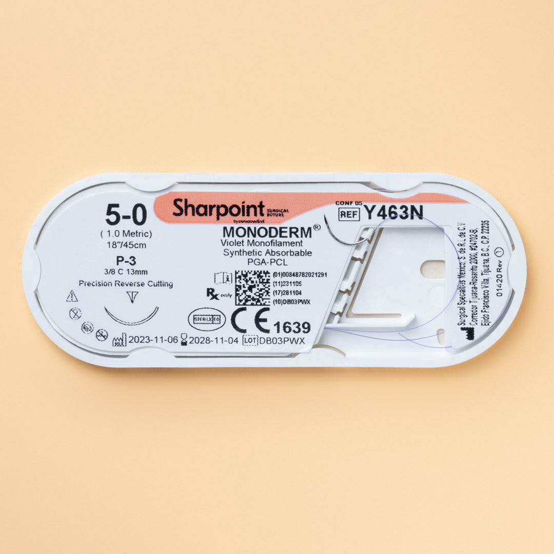 Sharpoint Monoderm Y463N 5-0 suture box and suture packaging, showcasing a violet monofilament suture of 18 inches with a P-3 precision reverse cutting needle. The box highlights its use for delicate surgical applications, emphasizing the suture's advanced PGA-PCL material for optimal performance and patient comfort