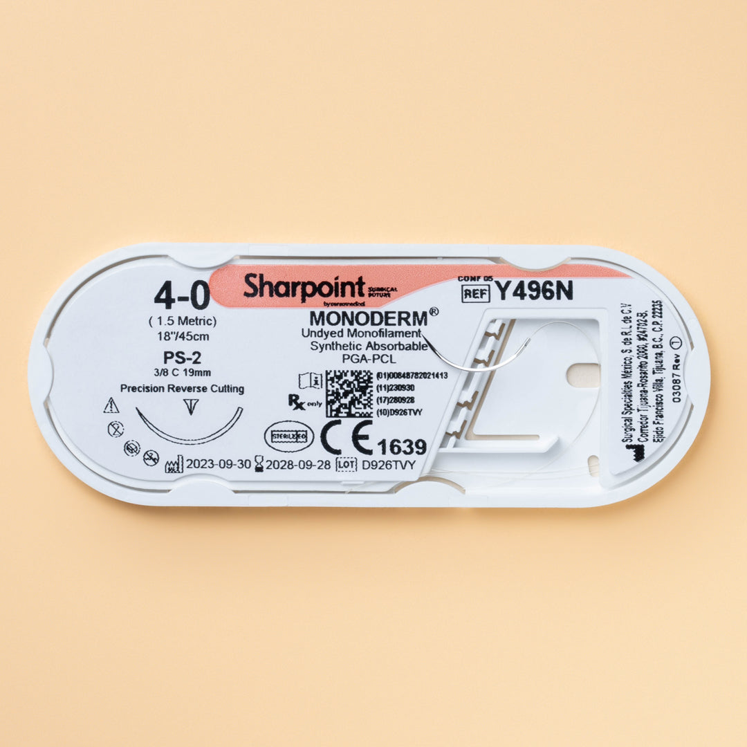A Sharpoint Monoderm box with reference Y496N, showcasing 12 precision reverse cutting needles attached to 18-inch undyed monofilament sutures of size 4-0, designed for medical and dental professionals. 