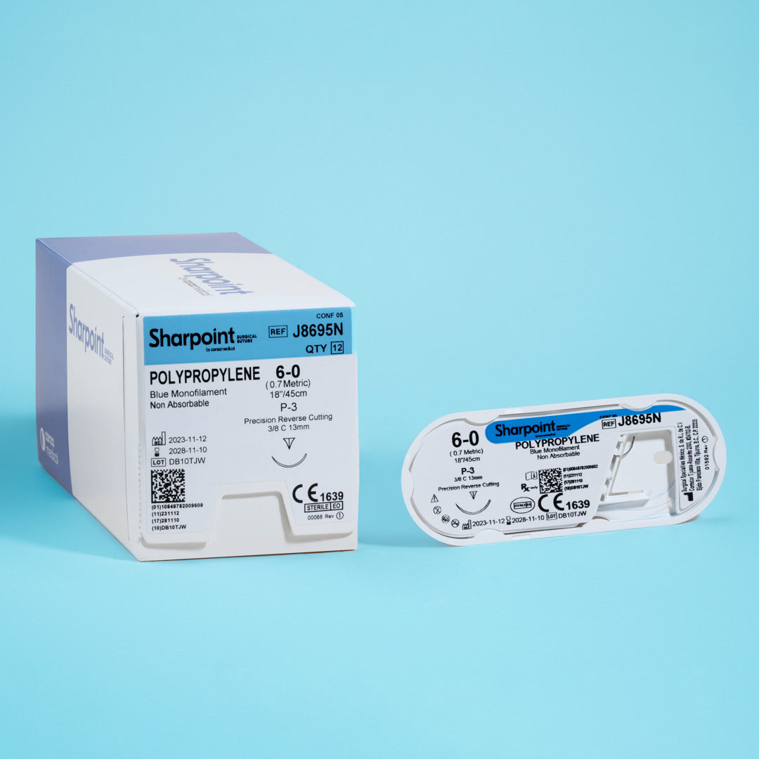 A box and suture packet of Sharpoint 6-0 blue polypropylene suture (J8695N), featuring a P-3 precision reverse cutting needle for exact suturing. This non-absorbable monofilament suture is designed for high-precision surgical procedures, offering lasting support and minimal tissue reaction. It's showcased as a key tool for professionals in specialized surgeries, emphasizing its quality and reliability