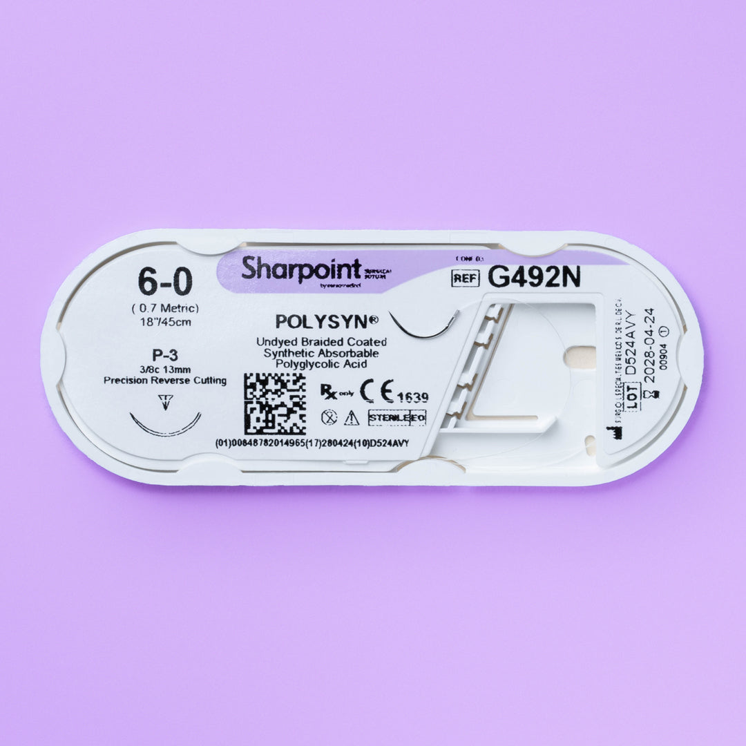 A box and an individual pack of Sharpoint 6-0 POLYSYN suture (G492N) with an 18-inch length and a P-3 precision reverse cutting needle. This synthetic absorbable, undyed braided suture is specifically designed for medical professionals seeking exceptional tissue compatibility, secure knotting, and predictable absorption for various surgical applications, highlighting its importance in enhancing surgical outcomes.