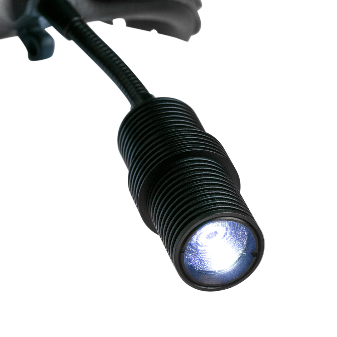 EliteVision surgical headlamp with LED light, adjustable focus, wireless operation, and extended battery life for precise surgical applications.