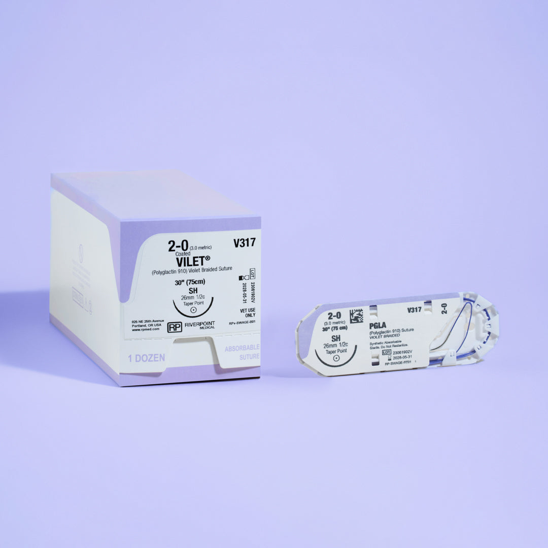 Image featuring the 2-0 VILET® Violet 30" SH Needle (V317) box alongside its open sterile packaging, highlighting the product's complete specifications and readiness for use in veterinary surgical procedures, manufactured by Riverpoint Medical.