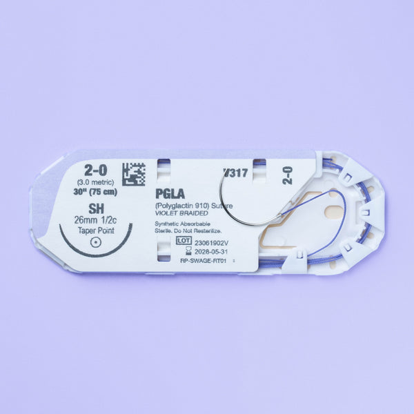 Close-up view of the 2-0 VILET® Violet Braided Suture with SH Needle (V317) in its sterile packaging, showcasing the suture size, material, needle type, and sterilization details, ready for veterinary surgical use.