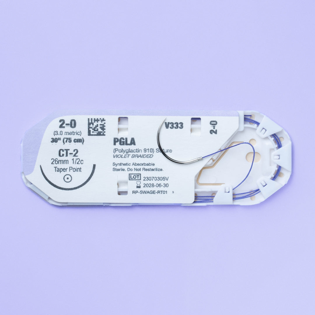 Close-up of the 2-0 VILET® Violet Braided Suture with CT-2 Needle (V333) in sterile packaging, highlighting the suture's specifications and sterile condition, prepared for veterinary surgical use.