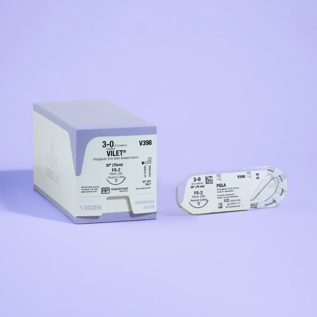 Image featuring the 3-0 VILET® Violet 30" FS-2 Needle (V398) packaging box next to its open sterile packaging, showing the product's specifications and readiness for veterinary surgical applications, manufactured by Riverpoint Medical.