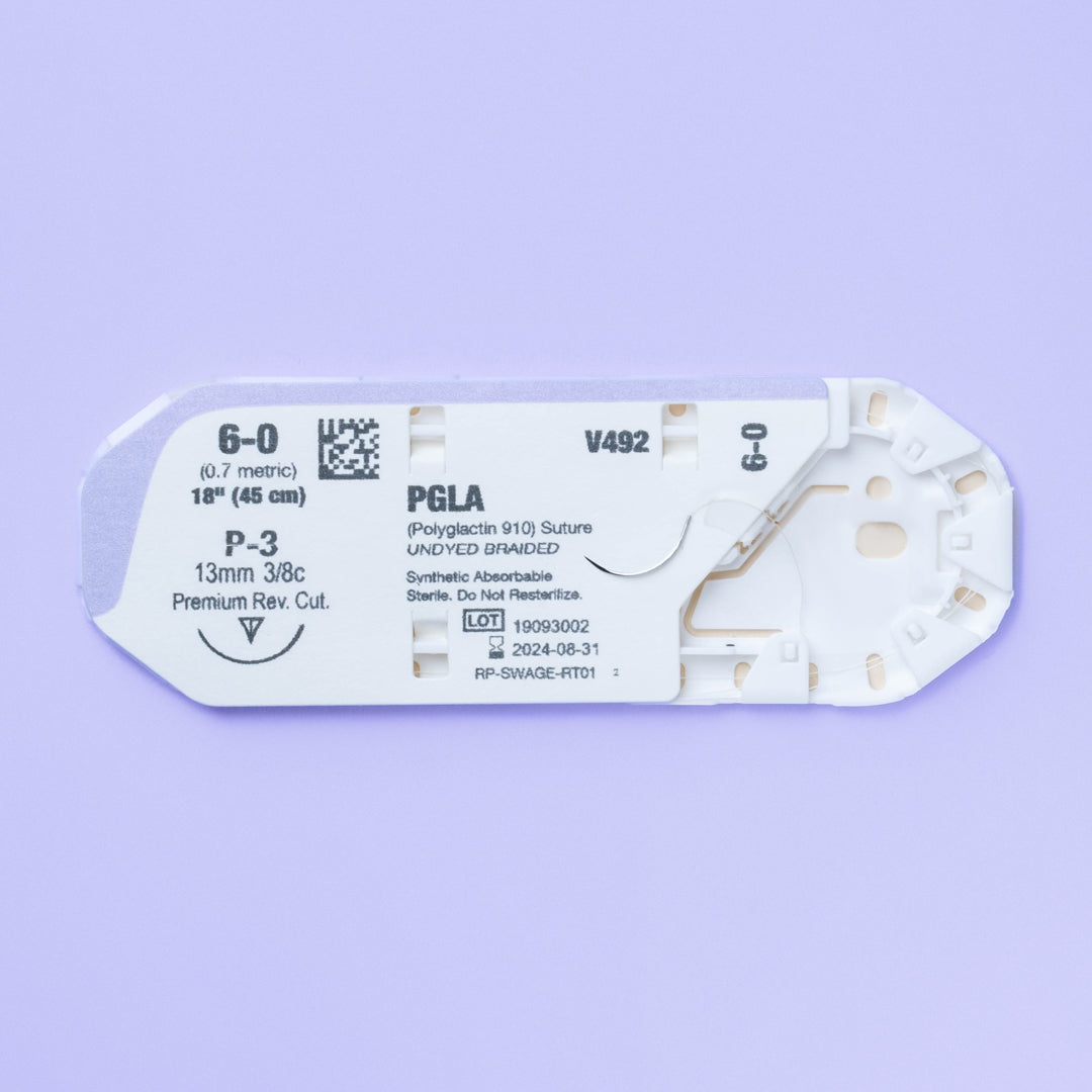 Close-up of the 6-0 VILET® Undyed Braided Suture with P-3 Needle (V492) in sterile packaging, emphasizing the suture's specifications and sterile status, prepared for precise veterinary surgical applications.