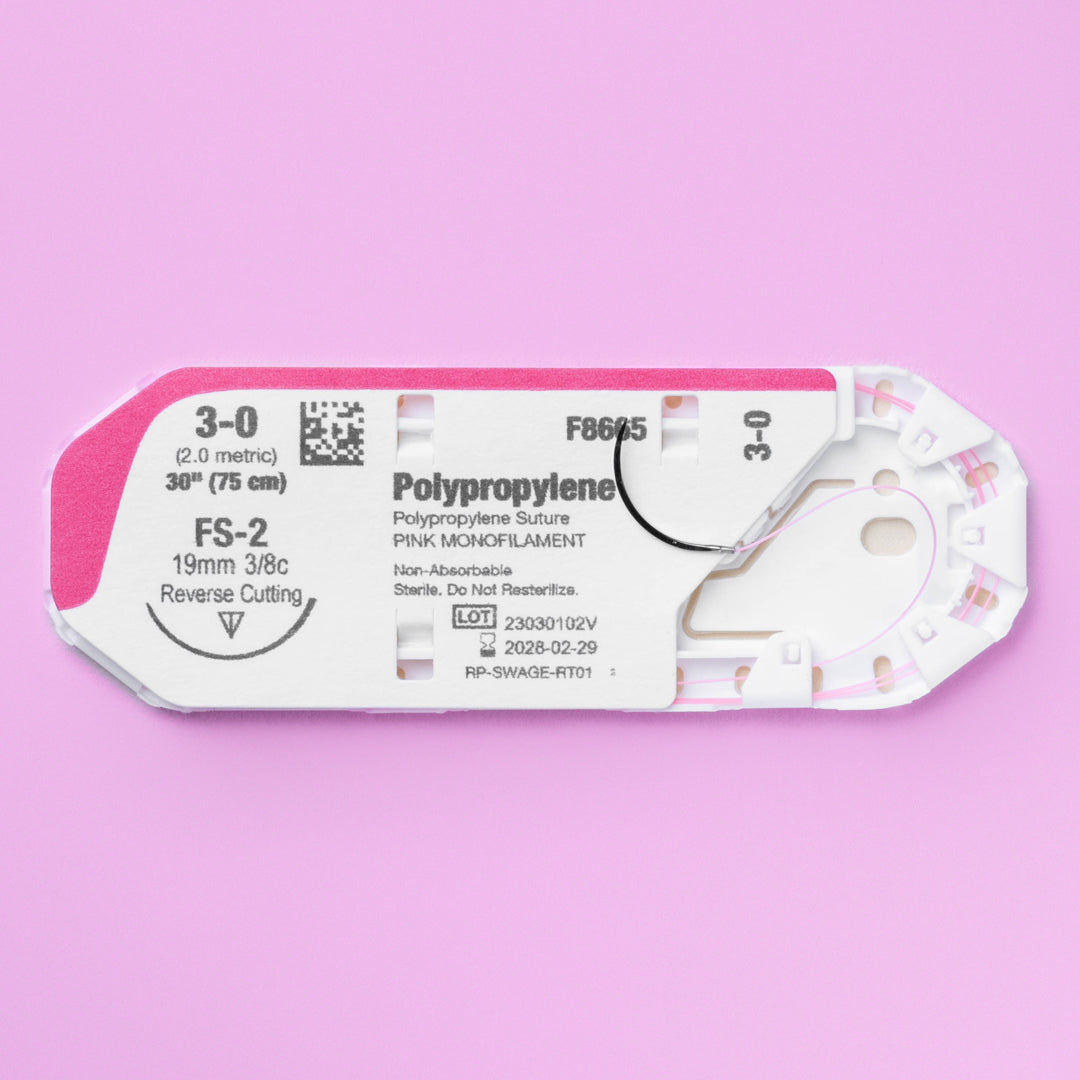 Close-up of the 3-0 ViSIPRO™ Polypropylene Monofilament Suture with FS-2 Needle (F8665) in sterile packaging, highlighting the pink monofilament suture and precision reverse cutting needle, ready for veterinary surgical application