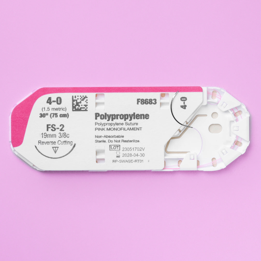Close-up of the 4-0 ViSIPRO™ Polypropylene Monofilament Suture with FS-2 Needle (F8683) in sterile packaging, emphasizing the pink monofilament suture and precision reverse cutting needle, ready for veterinary surgical application.